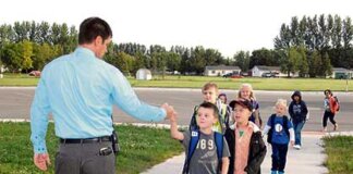 Challenger Elementary School Vice Principal Mike Wienen was at the bus drop-off zone at the school welcoming students to the first day of the 2014-15 school year. The District is welcoming close to 2050 students back to school this year. Student population has remained stable, if not grown slightly. More back to school photos are located under the "Big Blue Button" on our website.